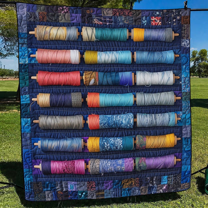 Bluish Spools Quilted Blanket