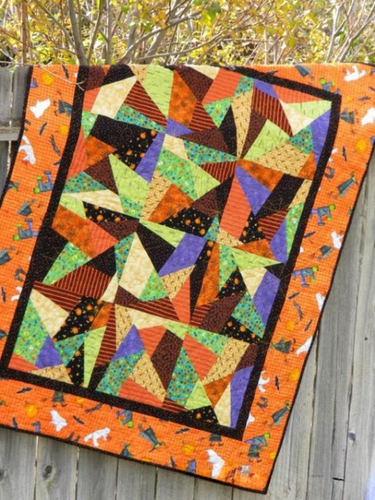 Shadowy Figures Quilted Blanket