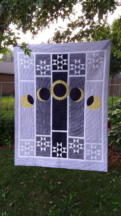 Eclipse Sky Quilted Blanket